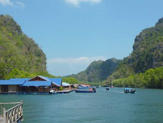 Visiting floating fish farm while on Langkawi Kilim Geoforest Mangrove boat tour 